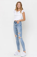 HIGH RISE DISTRESSED ANKLE SKINNY